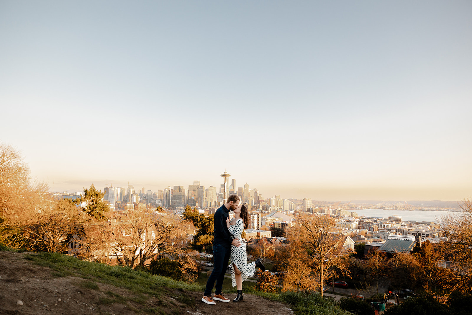 Couple kissing on the top of Kerry Park in Seattle